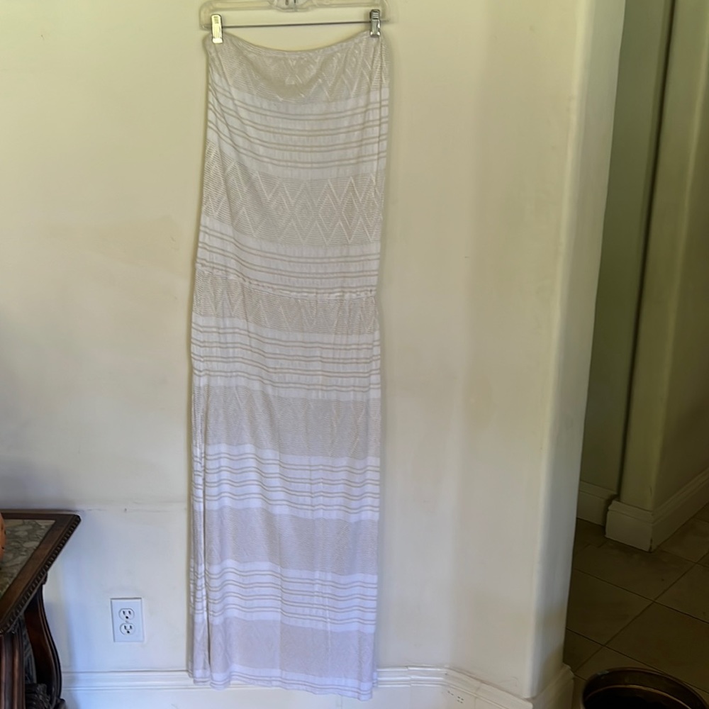 - Vitamin A strapless maxi dress in white with threads of gold. Size large
